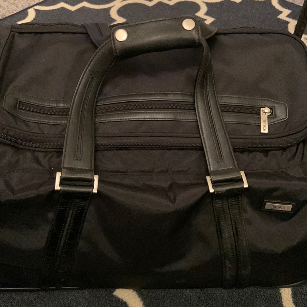 TUMI travel 21” duffel, handle and wheels